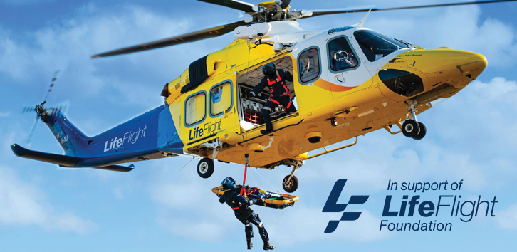 LifeFlight helicopter providing emergency aeromedical transport in rural Queensland.